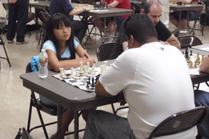 Queena Deng in her win over Hector Valdez.