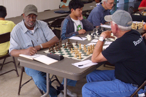 Marcus Benton (left) takes on Melvin Bond in round 6.
