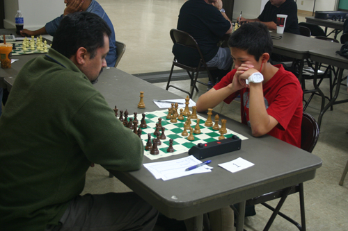 Ryan Chen (right) in his extraordinary game against Henry Castro.