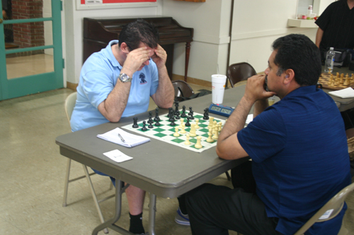 David Bassett (left) deep in concentration against Henry Castro.
