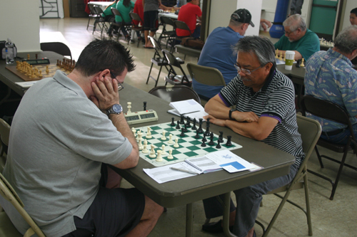 Raoul Crisologo (right) in his decisive game against David Bassett.